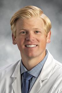 Photo of Dr. Caid