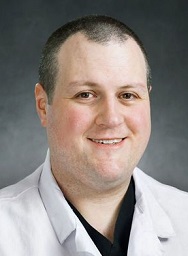 Headshot of Corey Doremus, PhD