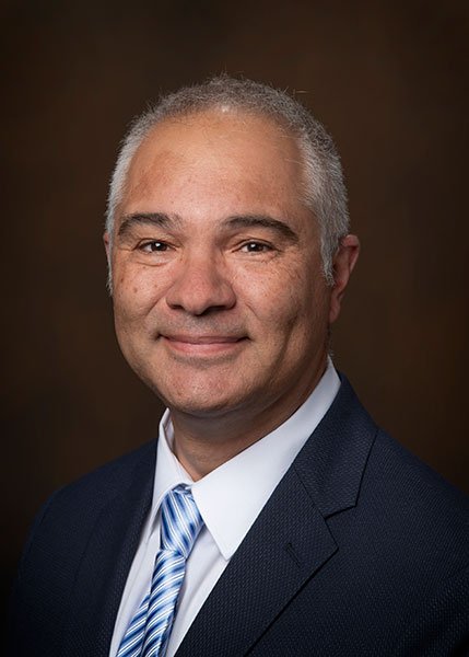 Michael E Dinos