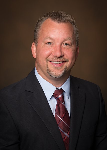 Justin O Wilson, AuD