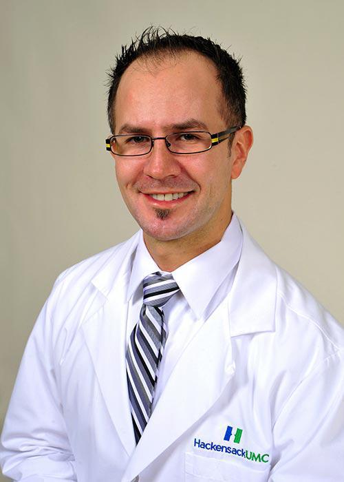 Dr. John Mesa, MD