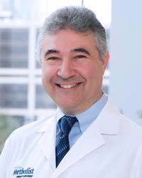 Kent Erickson, MD,  PhD,  FAAFP