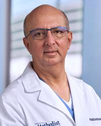 Mahesh Ramchandani, MD,  FRCS,  FACS