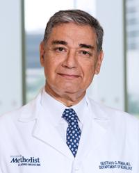 Gustavo C. Román, MD, DrHC