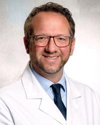 Claus Reinsberger, MD, PhD