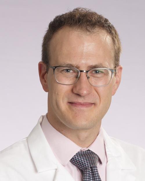 Justin L Adams, MD